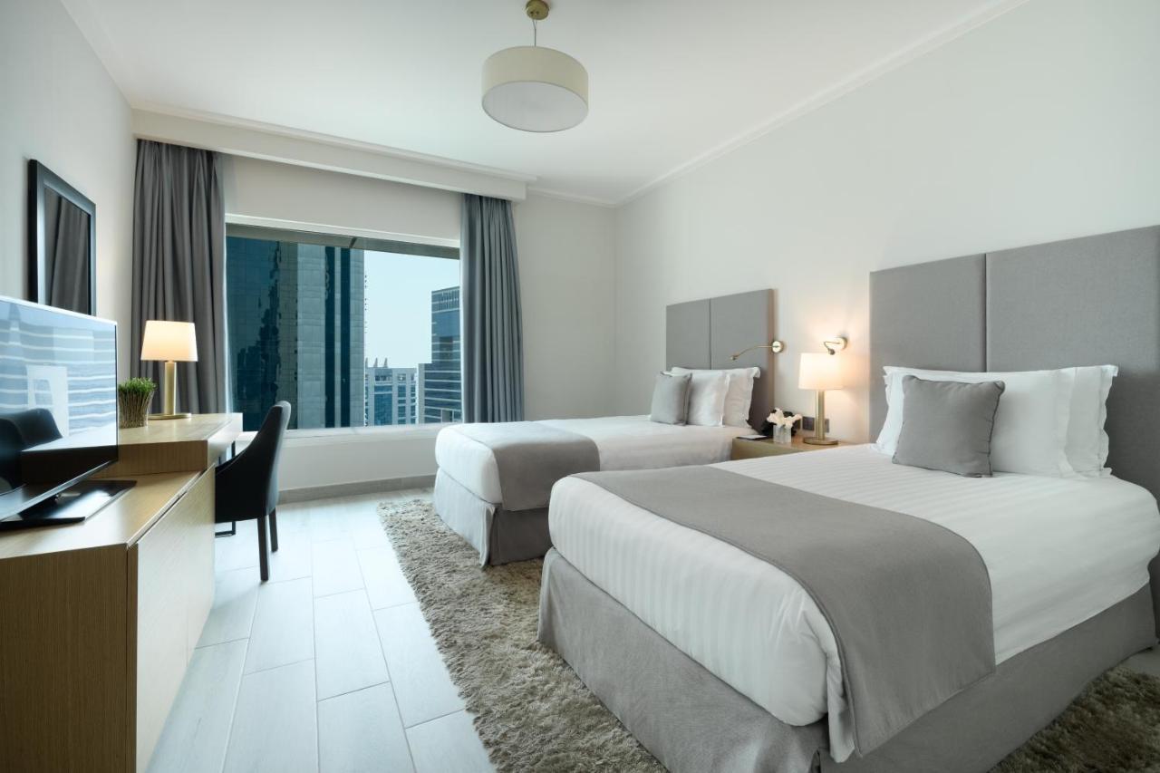 Centara West Bay Hotel & Residences ドーハ エクステリア 写真 A guest room at the hotel