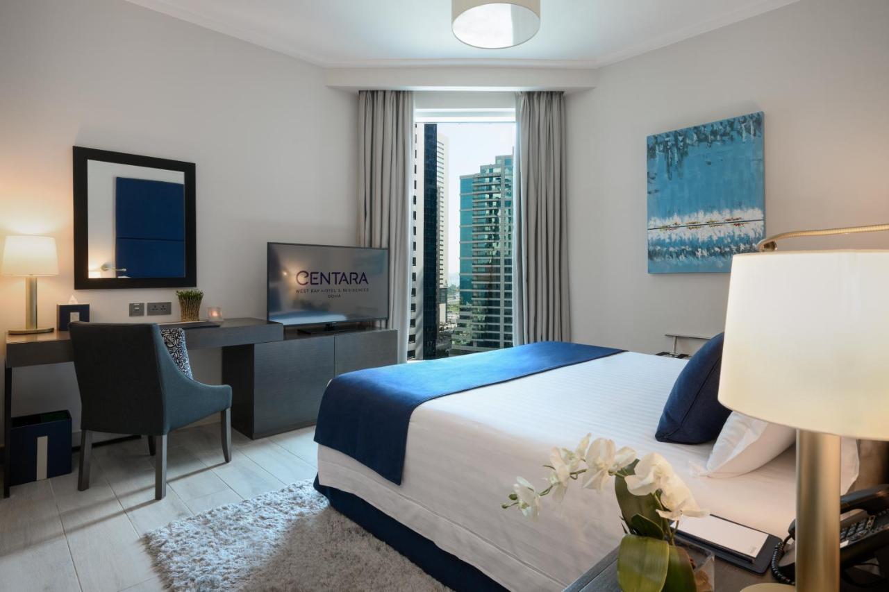 Centara West Bay Hotel & Residences ドーハ エクステリア 写真 A bedroom at the hotel