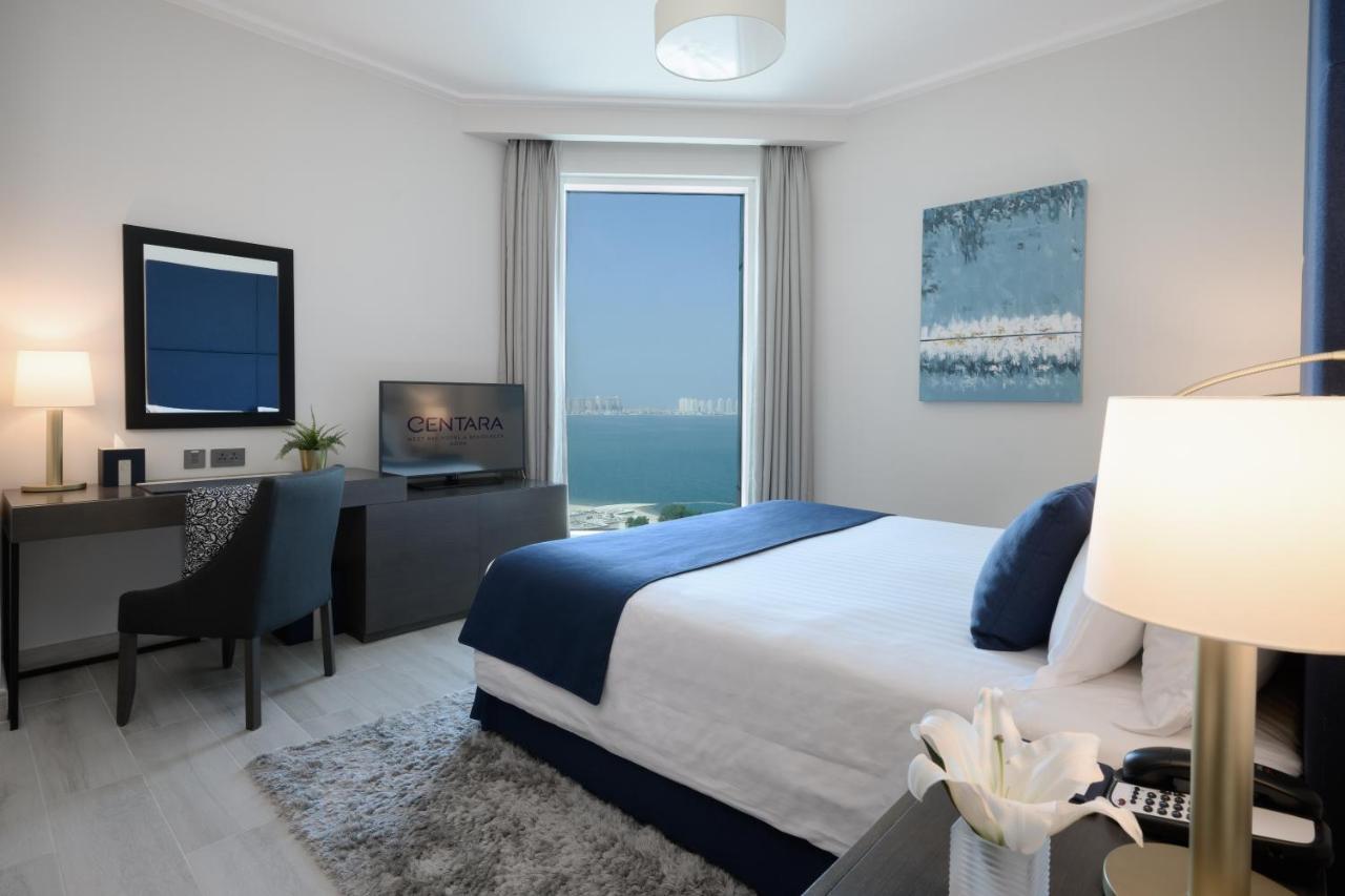 Centara West Bay Hotel & Residences ドーハ エクステリア 写真 A bedroom at the Ritz-Carlton, Bahrain